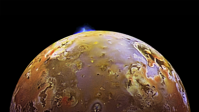 Io with a volcanic plume at the top